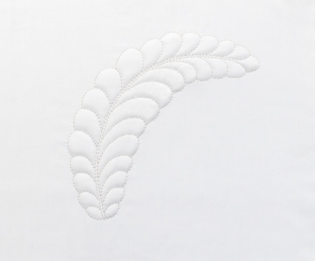 Zbliżenie haftu na tkaninie